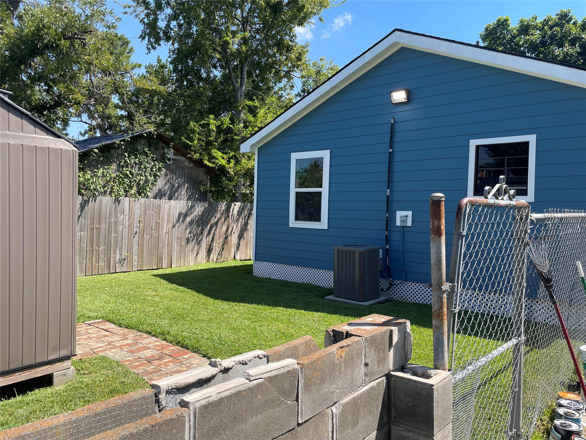 2709 Terry Street Houston, TX 77009 - Photo 22 of 23 a backyard of a house with seating space