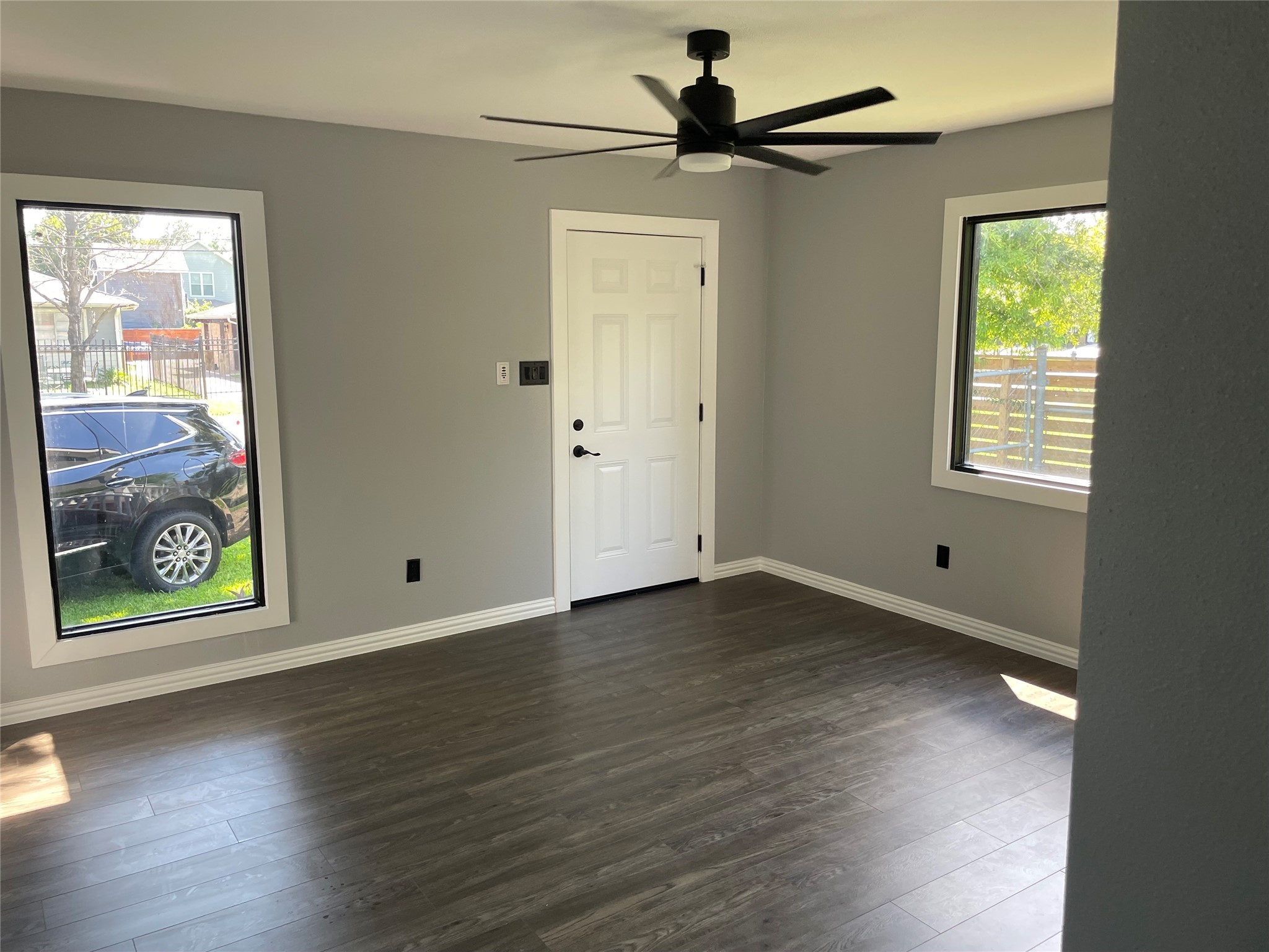 2709 Terry Street Houston, TX 77009 - Photo 5 of 23 wooden floor in an empty room with a window
