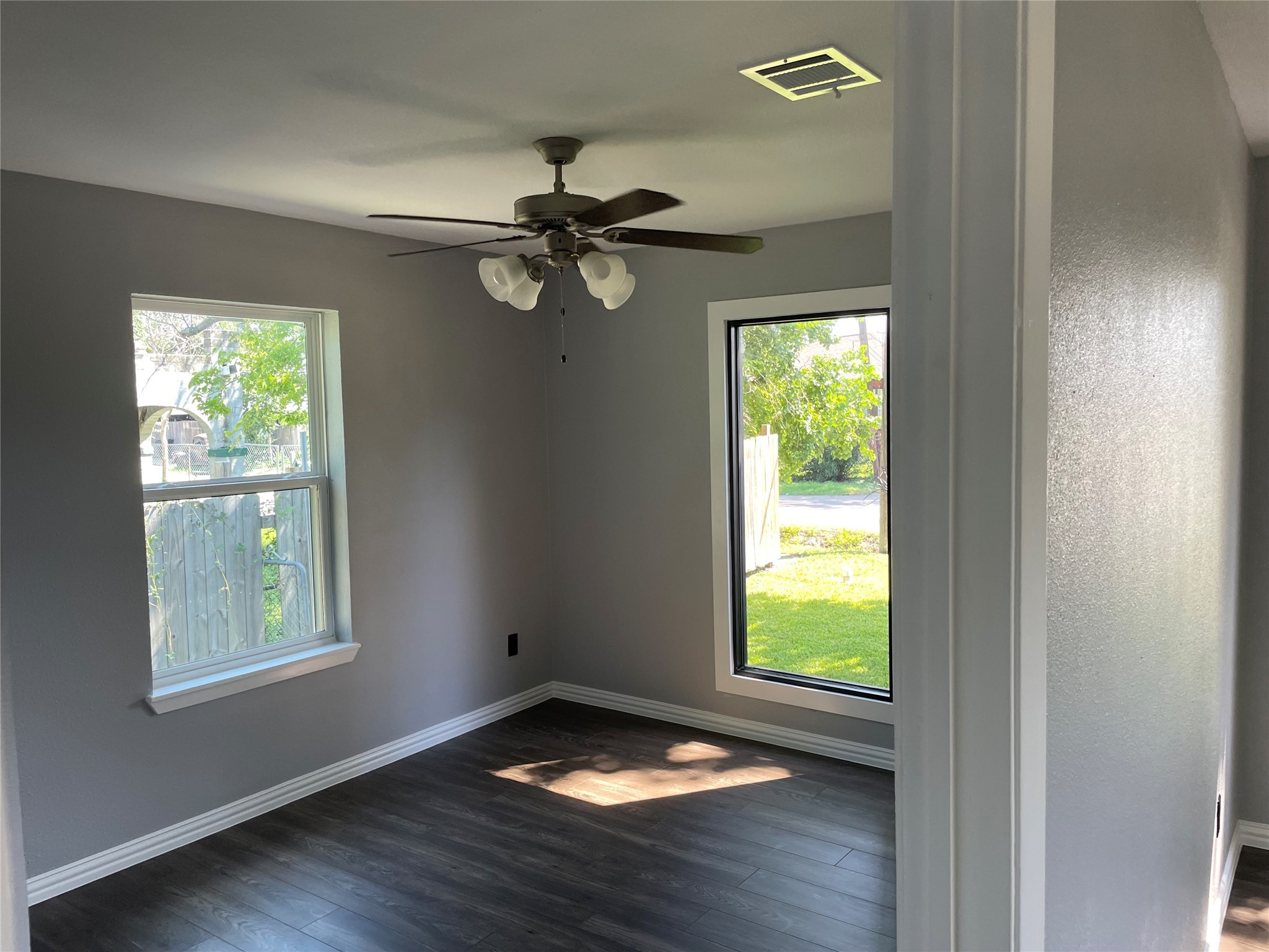 2709 Terry Street Houston, TX 77009 - Photo 10 of 23 a view of empty room with wooden floor and fan