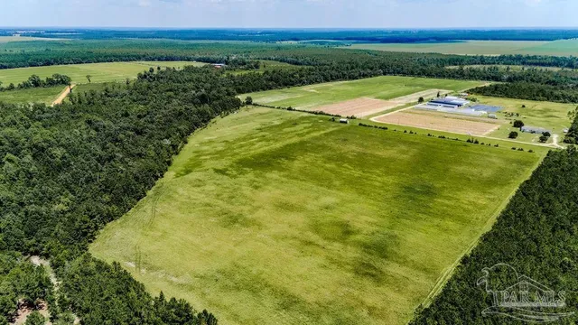 a view of a lake with a yard