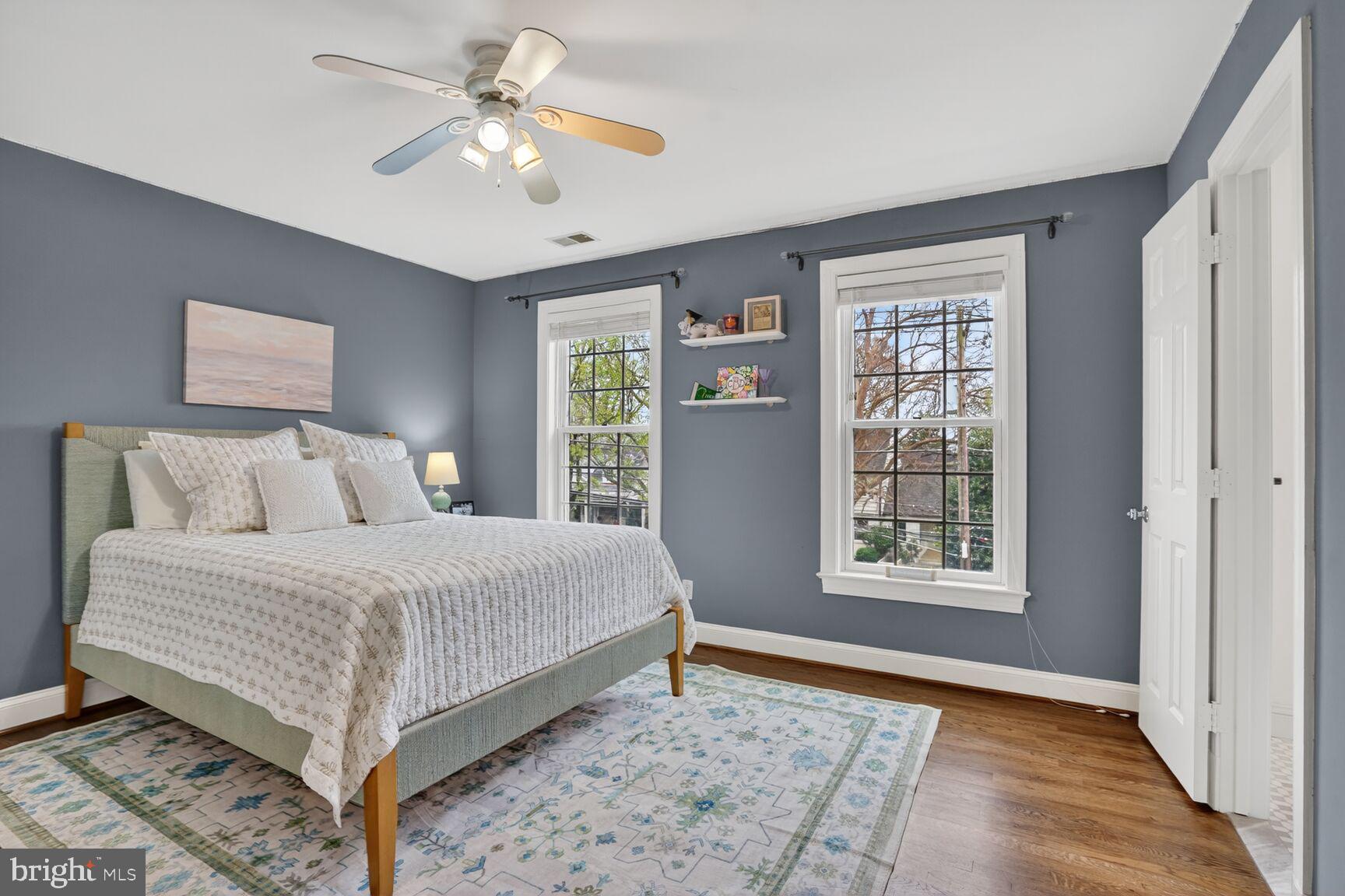4837 W Street Northwest Washington, DC 20007 - Photo 32 of 51 a spacious bedroom with a bed and a window