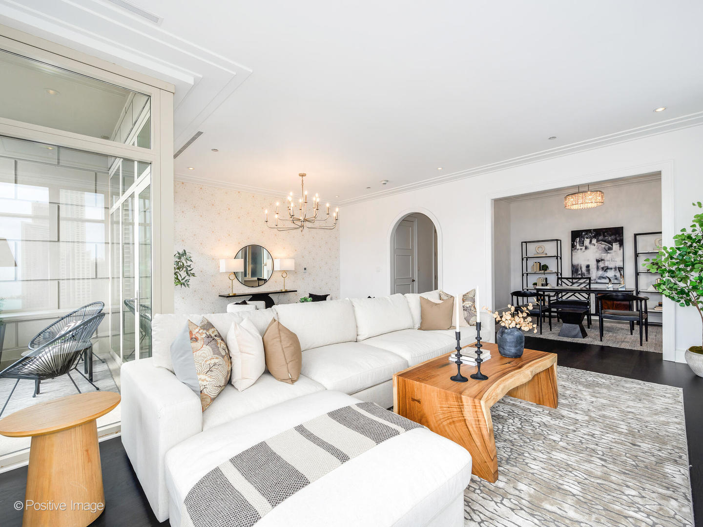 118 East Erie Street, Unit 31G Chicago, IL 60611 - Photo 12 of 54 a living room with furniture and a table