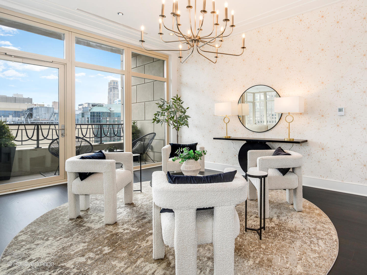118 East Erie Street, Unit 31G Chicago, IL 60611 - Photo 13 of 54 a living room with dining table a chandelier and a floor to ceiling window