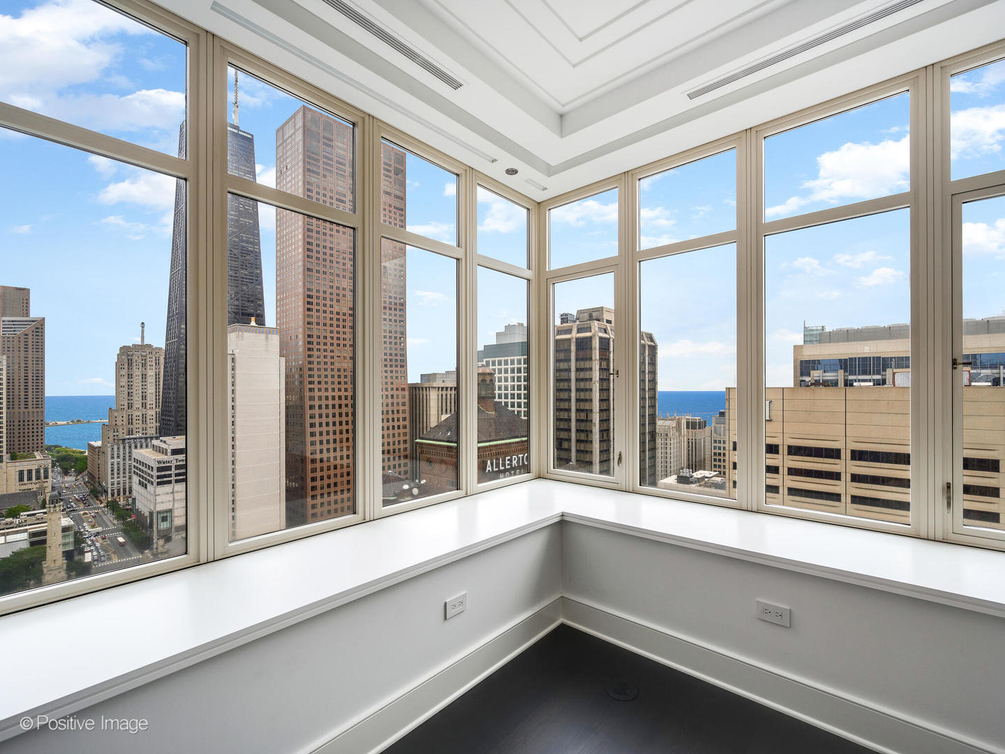 118 East Erie Street, Unit 31G Chicago, IL 60611 - Photo 15 of 54 a view of lot of windows with city view