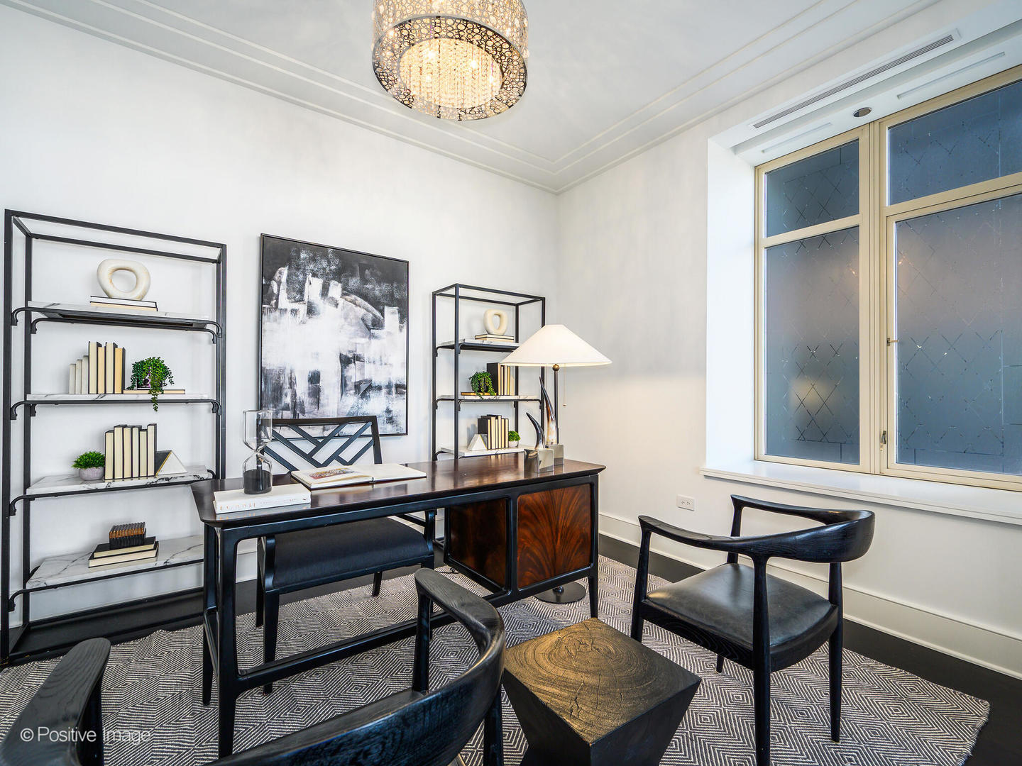 118 East Erie Street, Unit 31G Chicago, IL 60611 - Photo 18 of 54 a view of a workspace room with furniture and wooden floor