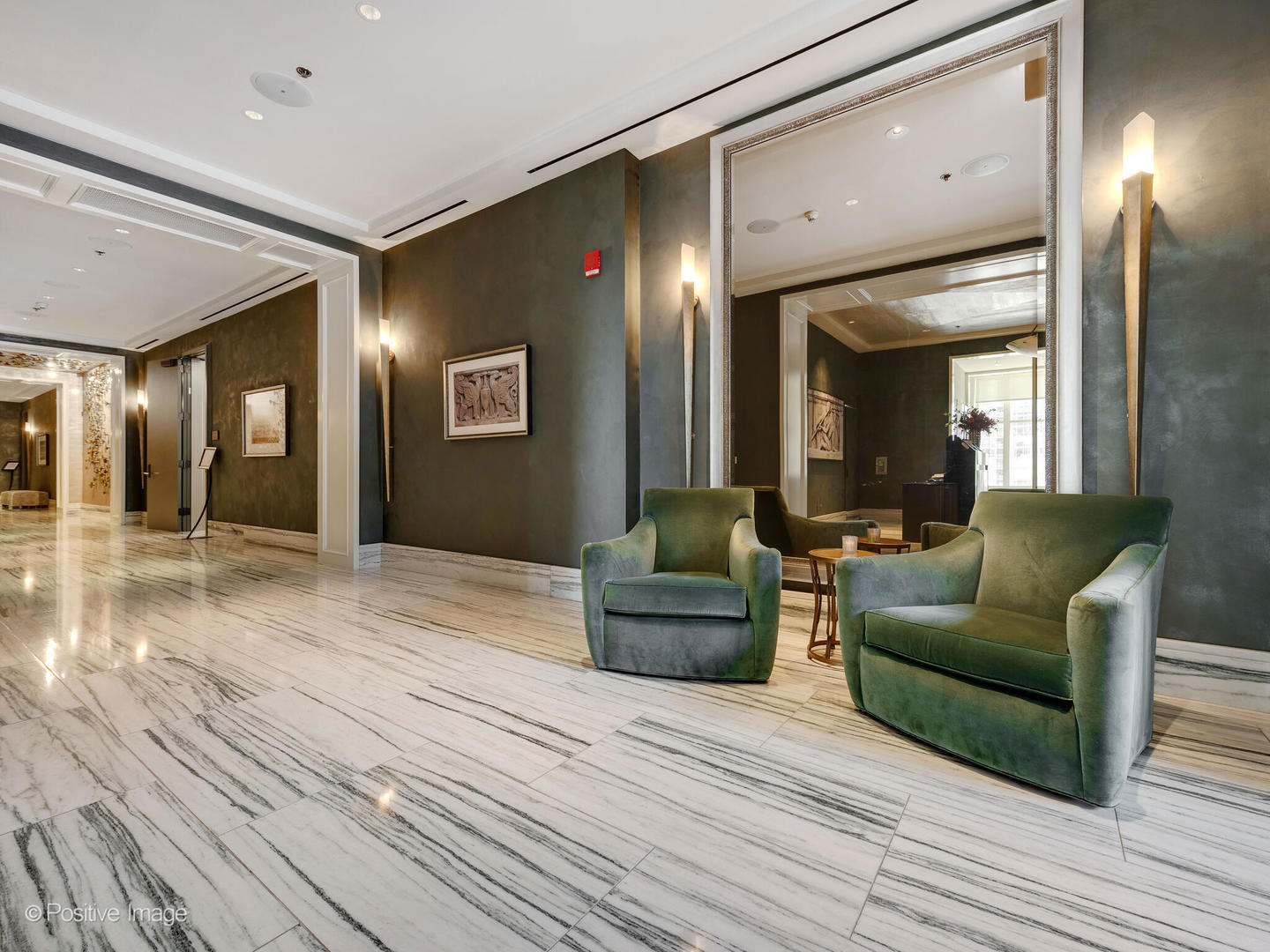 118 East Erie Street, Unit 31G Chicago, IL 60611 - Photo 2 of 54 a living room with furniture and a wooden floor