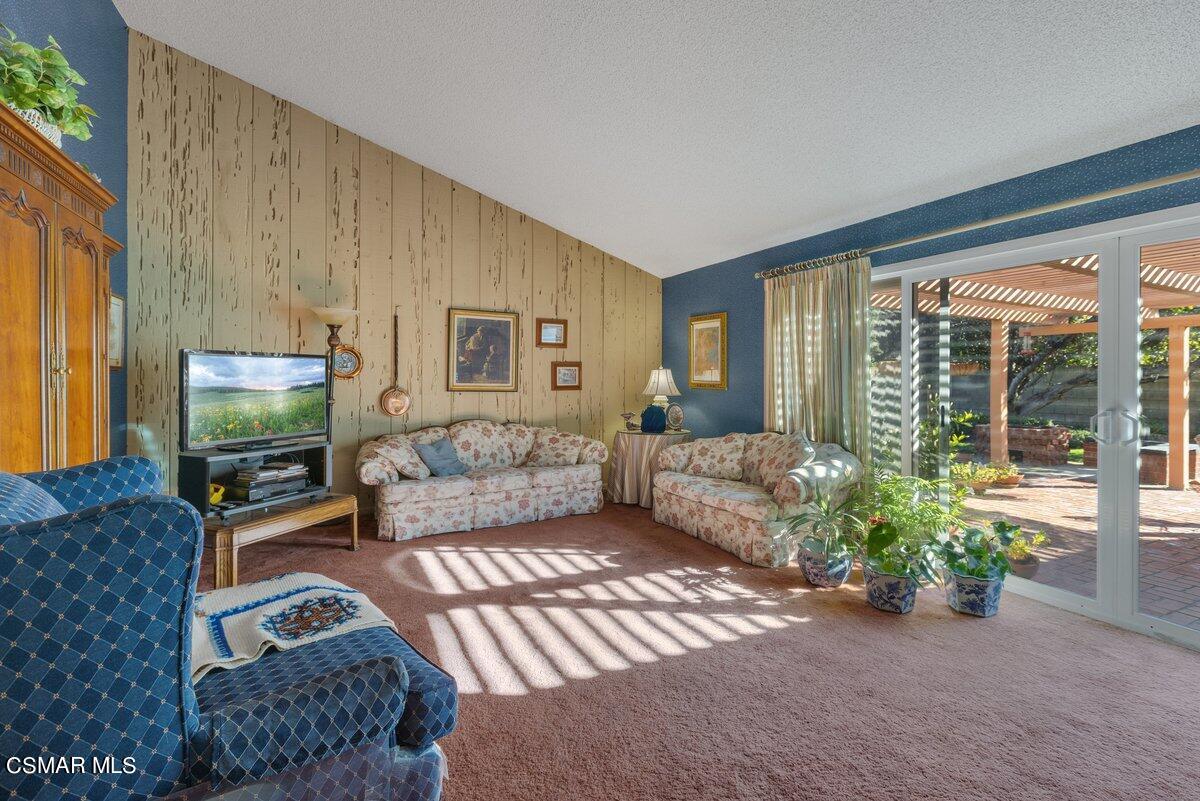 2268 Pinecrest Street Simi Valley, CA 93065 - Photo 12 of 28 a living room with furniture and a flat screen tv