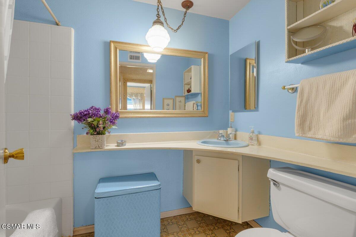 2268 Pinecrest Street Simi Valley, CA 93065 - Photo 16 of 28 a view of bathroom with a sink and mirror