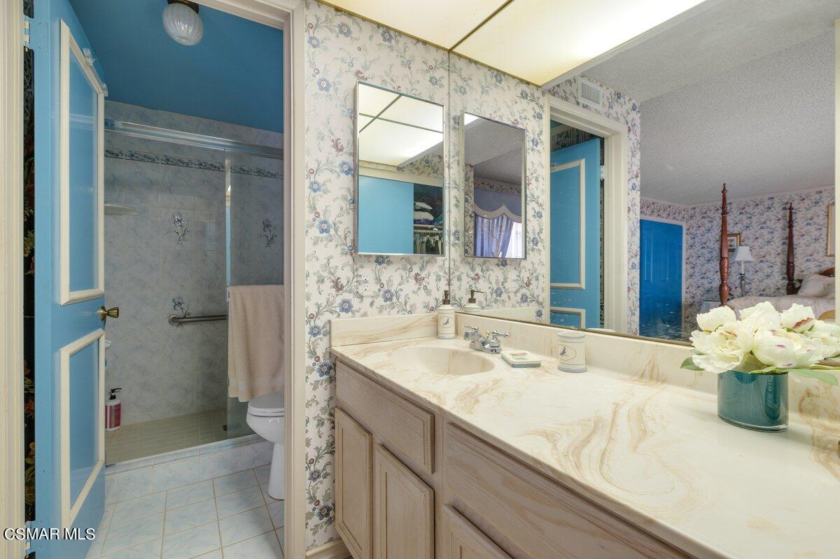 2268 Pinecrest Street Simi Valley, CA 93065 - Photo 17 of 28 a bathroom with a sink and a mirror