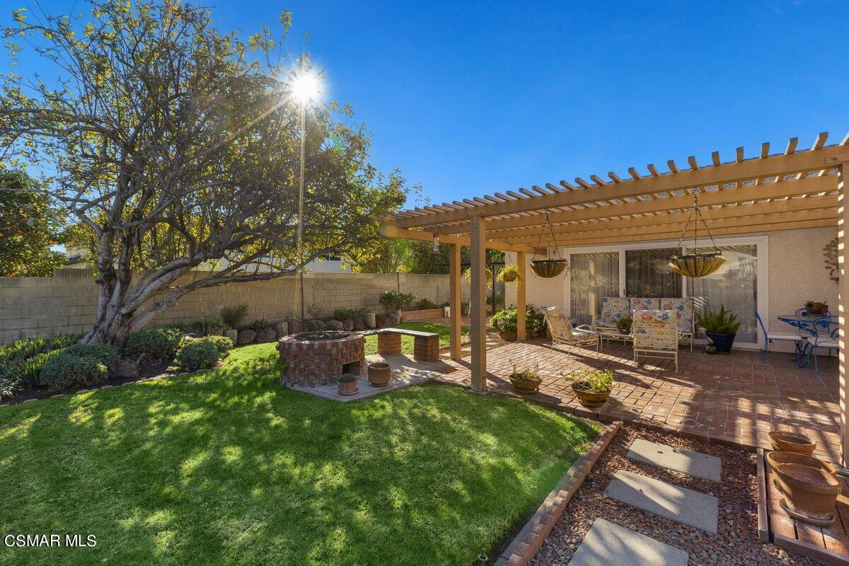 2268 Pinecrest Street Simi Valley, CA 93065 - Photo 21 of 28 a view of a house with backyard and sitting area