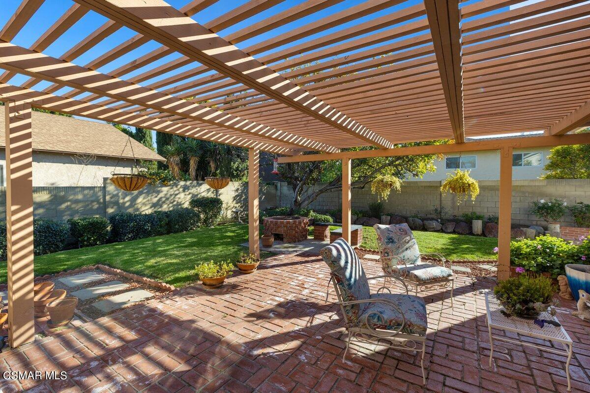 2268 Pinecrest Street Simi Valley, CA 93065 - Photo 24 of 28 a view of a patio with table and chairs and potted plants