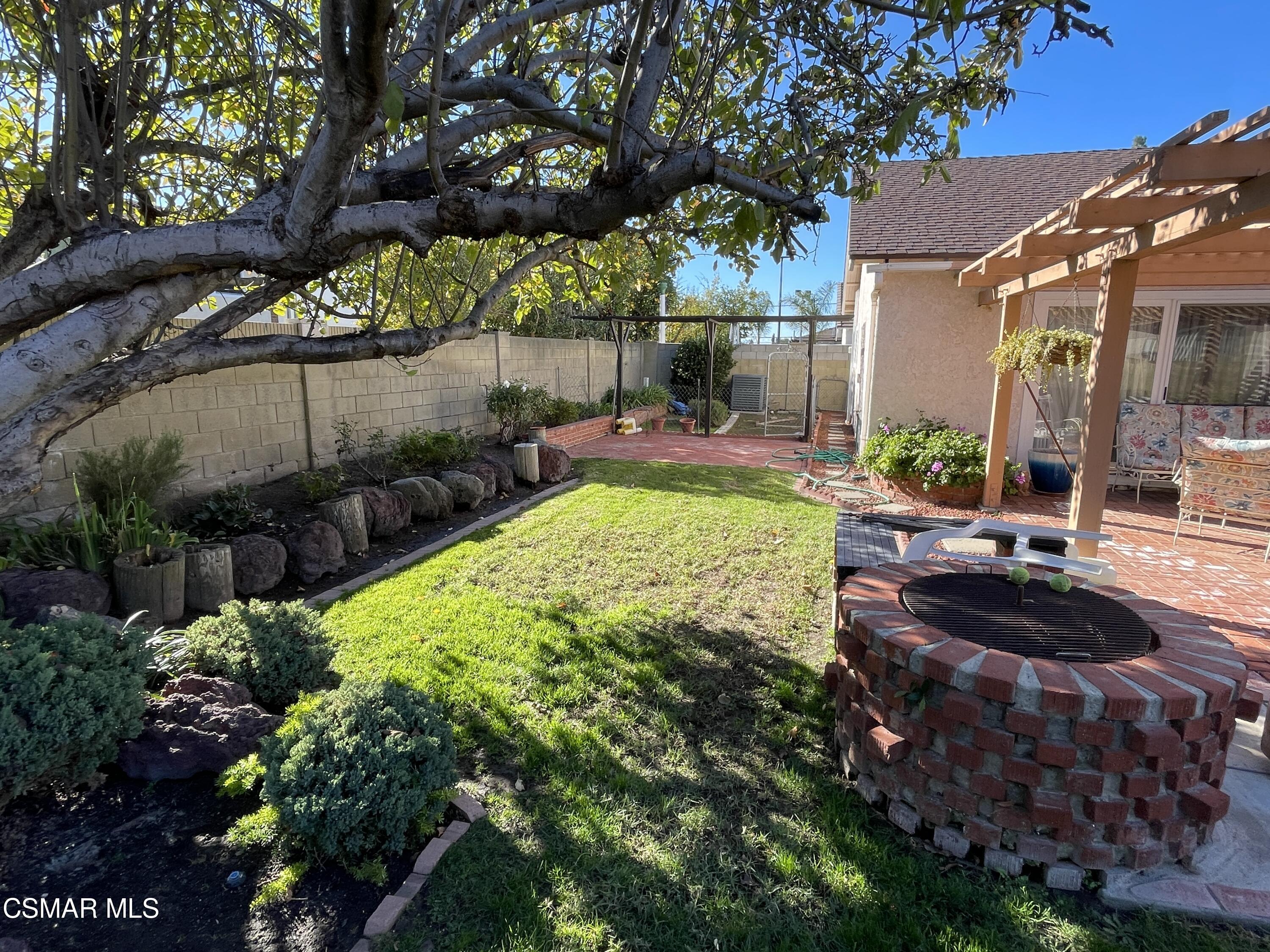 2268 Pinecrest Street Simi Valley, CA 93065 - Photo 27 of 28 a view of a backyard with a patio