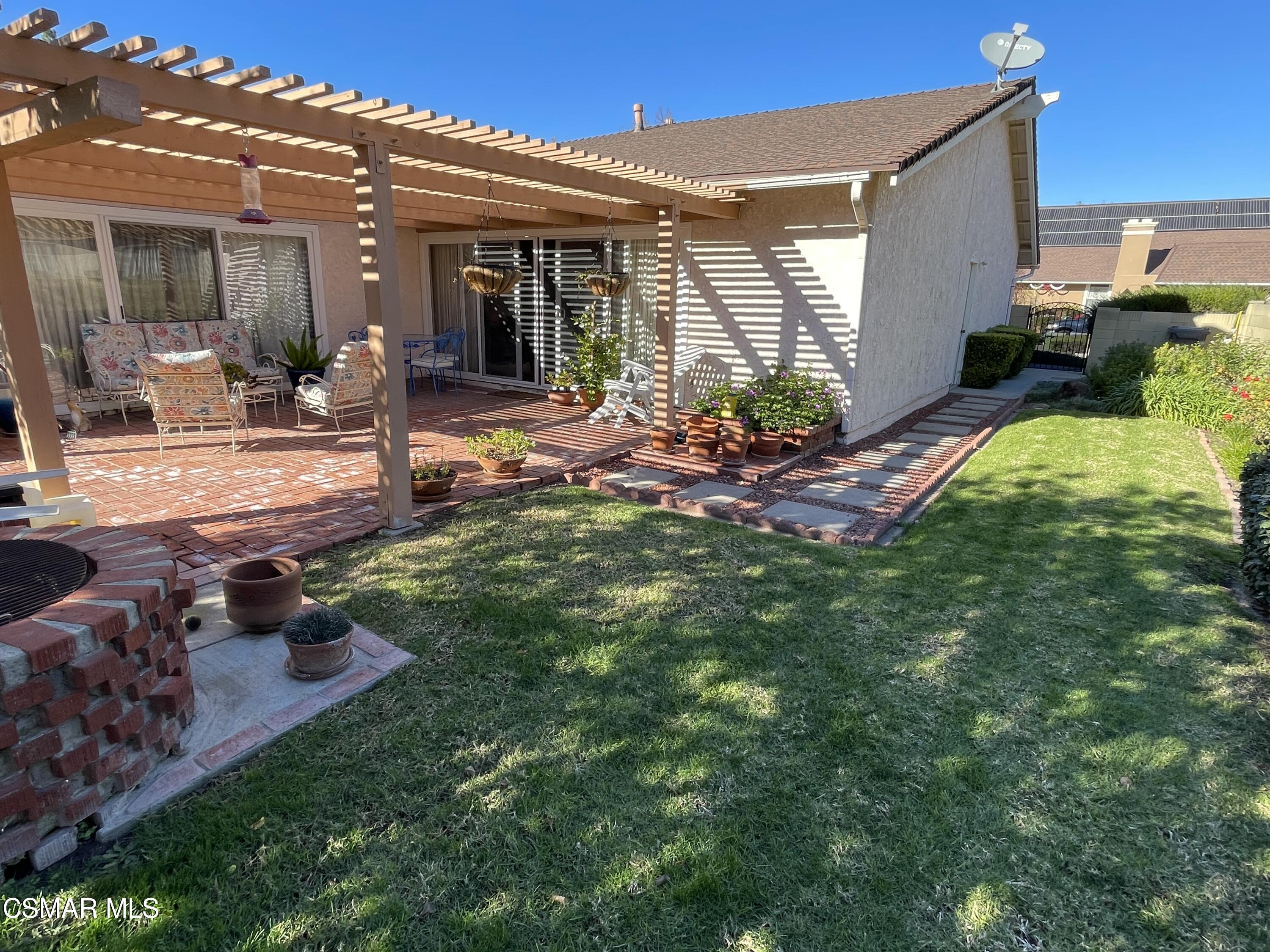 2268 Pinecrest Street Simi Valley, CA 93065 - Photo 28 of 28 a view of a house with backyard porch and sitting area