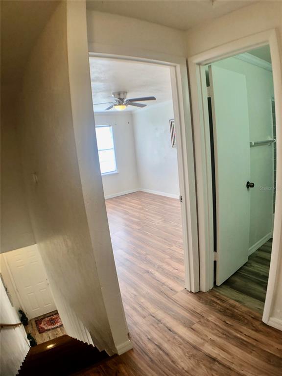 5403 Northwest 20th Court, Unit C Gainesville, FL 32653 - Photo 9 of 21 wooden floor in a gallery