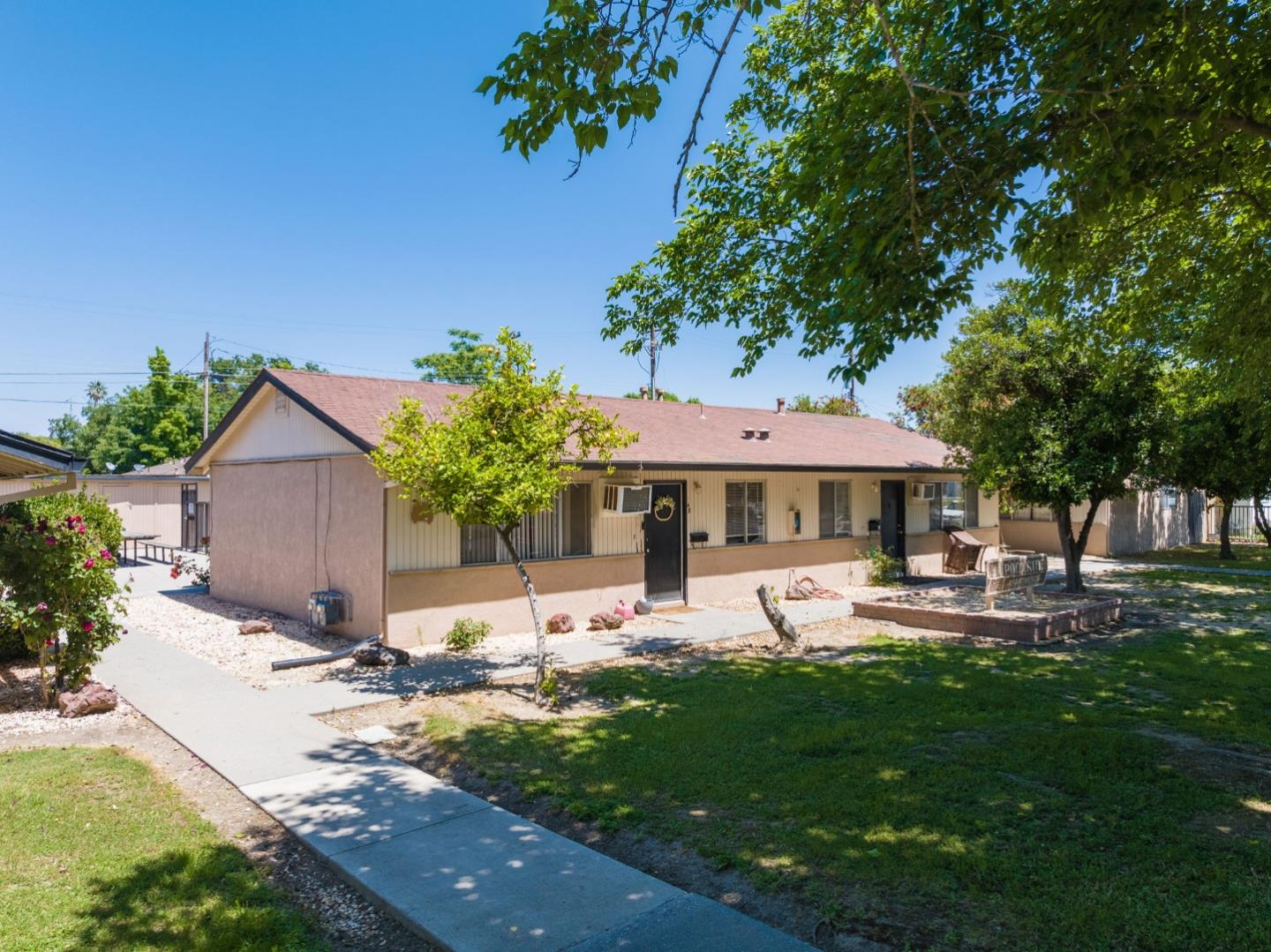 30 Webster Street Colusa, CA 95932 - Photo 7 of 17 a view of a house with backyard sitting area and garden