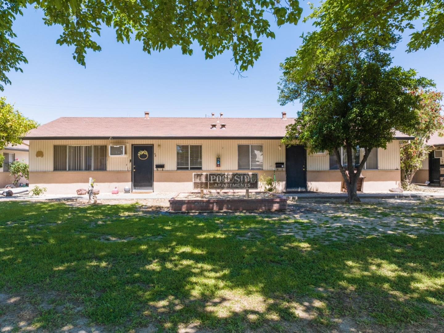 30 Webster Street Colusa, CA 95932 - Photo 10 of 17 a front view of a house with a yard table and chairs