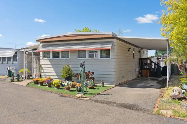 a front view of a house with yard