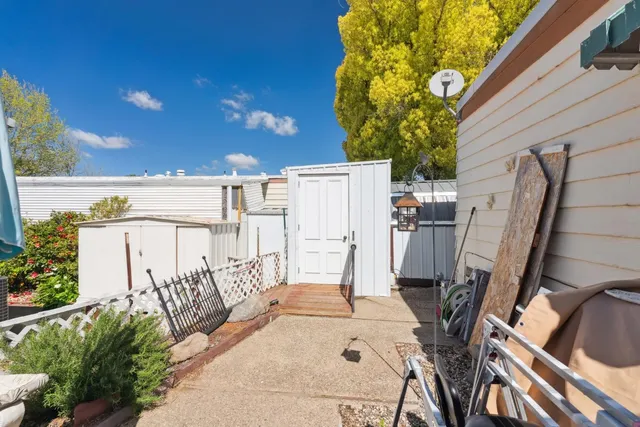a view of a houses with a street