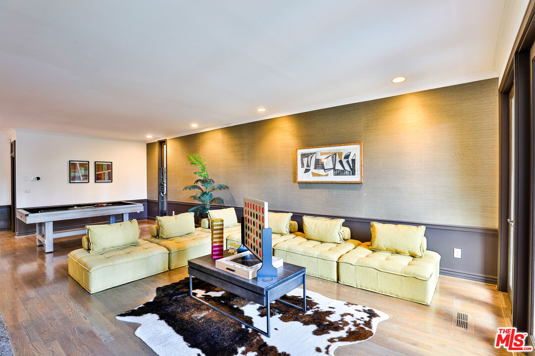 14839 Valley Vista Boulevard Sherman Oaks, CA 91403 - Photo 23 of 65 a living room with furniture and wooden floor