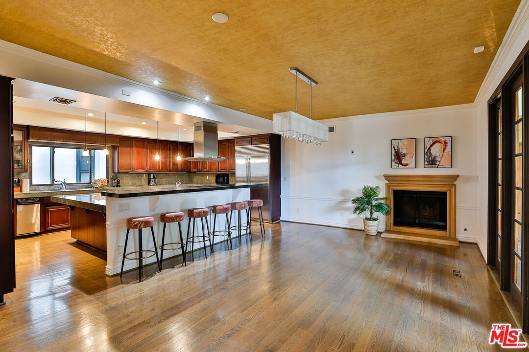 14839 Valley Vista Boulevard Sherman Oaks, CA 91403 - Photo 24 of 65 a view of an empty room with window and fireplace
