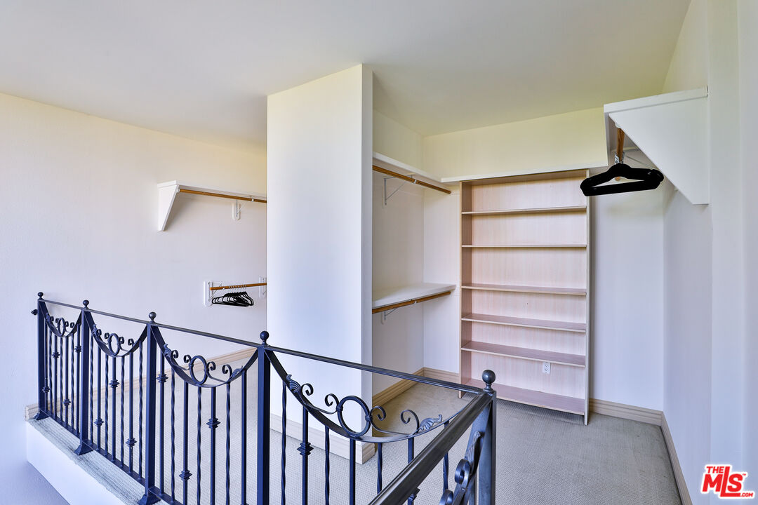 14839 Valley Vista Boulevard Sherman Oaks, CA 91403 - Photo 35 of 65 a view of entryway with stairs and wooden floor