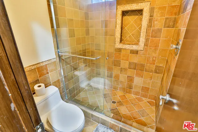 a view of a balcony and floor to ceiling window