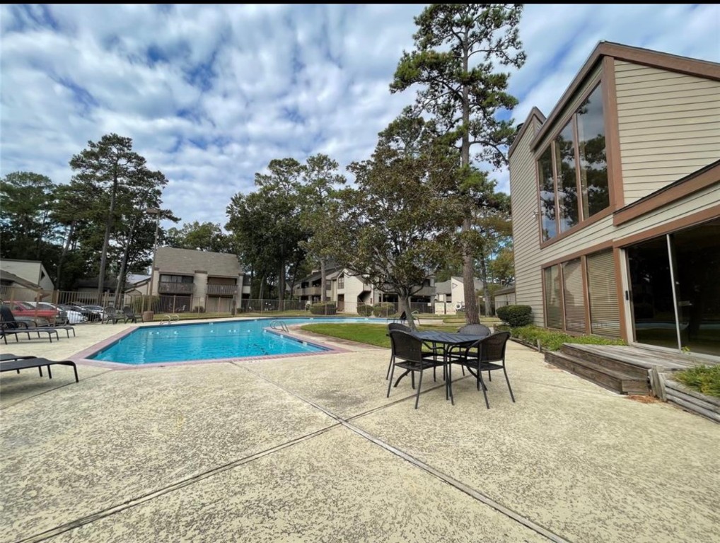 12900 Walden Road, Unit 1010J Montgomery, TX 77356 - Photo 13 of 41 One of two pools at The 18th at Walden.