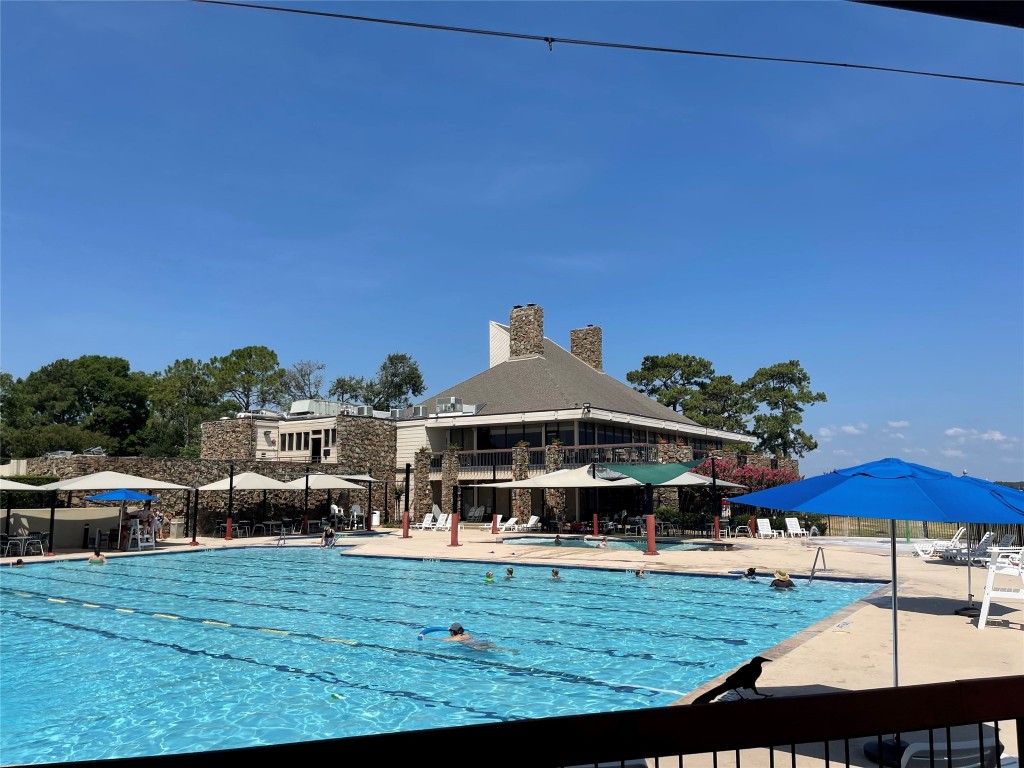 12900 Walden Road, Unit 1010J Montgomery, TX 77356 - Photo 16 of 41 Enjoy a day in the sun at the pool at Walden!