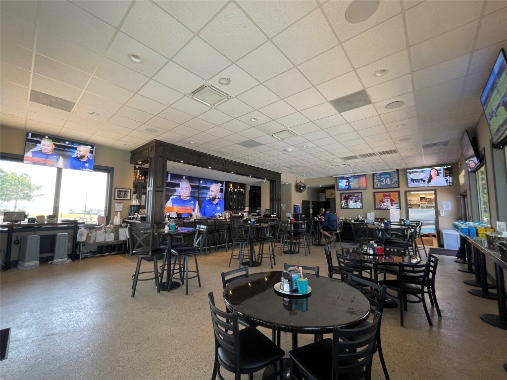 12900 Walden Road, Unit 1010J Montgomery, TX 77356 - Photo 18 of 41 Watch your favorite Sports Game at the Break Water Grill.