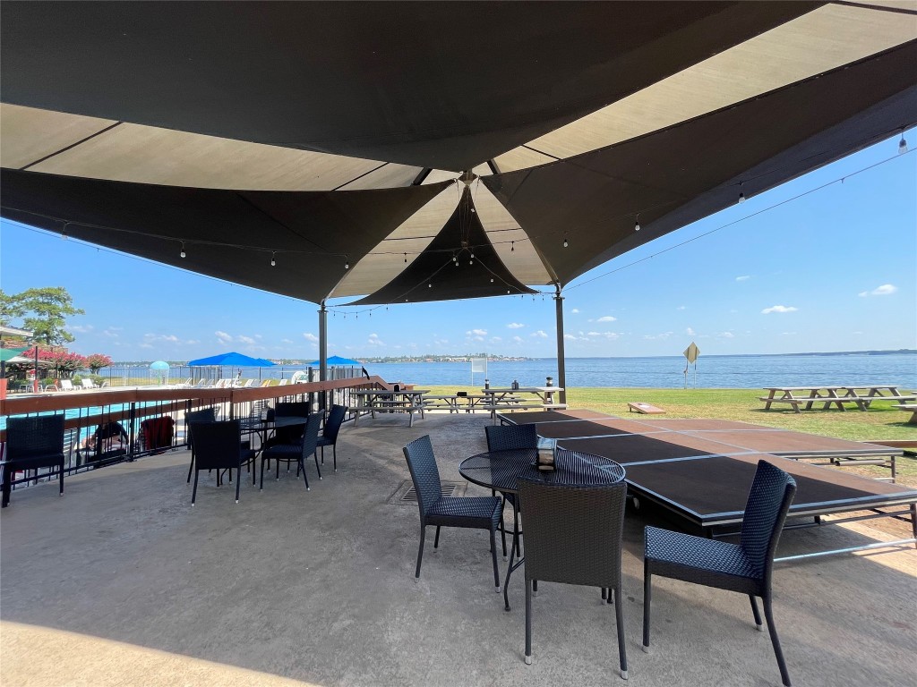 12900 Walden Road, Unit 1010J Montgomery, TX 77356 - Photo 20 of 41 Outdoor Dining with Beautiful views of Lake Conroe from Break Water Grill!