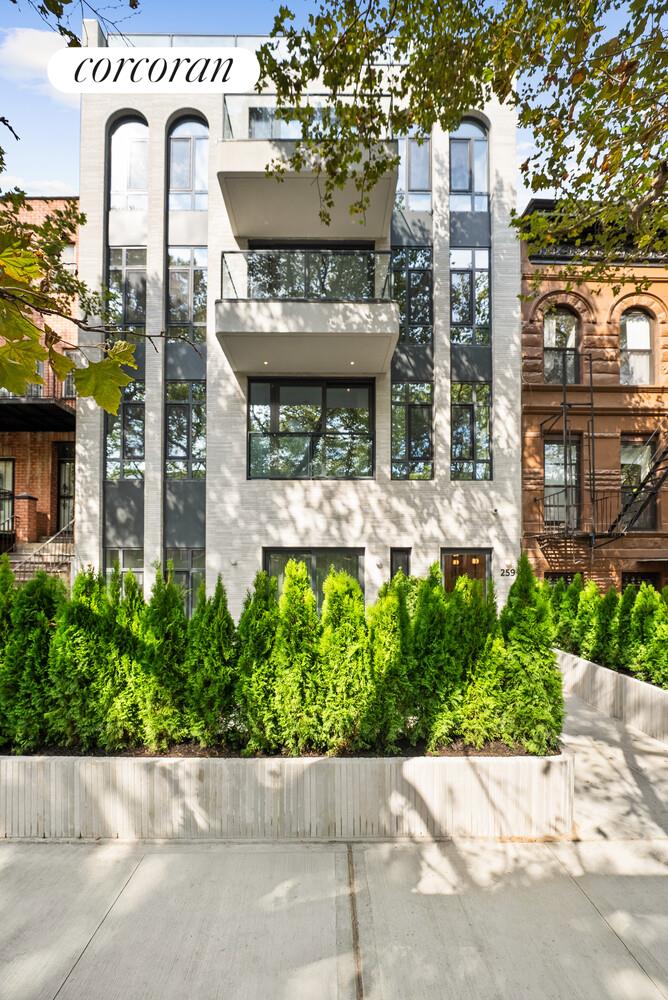 259 Halsey Street, Unit 3R Brooklyn, NY 11216 - Photo 9 of 10 a view of building with yard