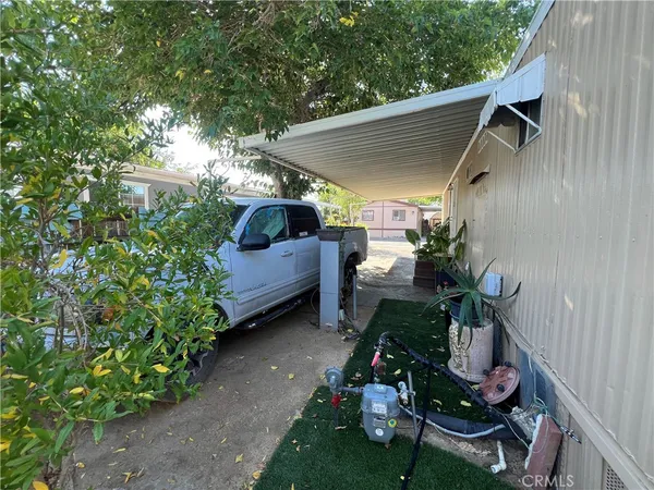 a view of yard with patio