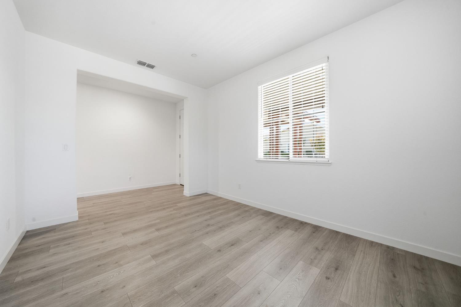 648 Edgewood Loop Angels Camp, CA 95222 - Photo 5 of 58 LIVING ROOM/DEN OFF OF FRONT ENTRY