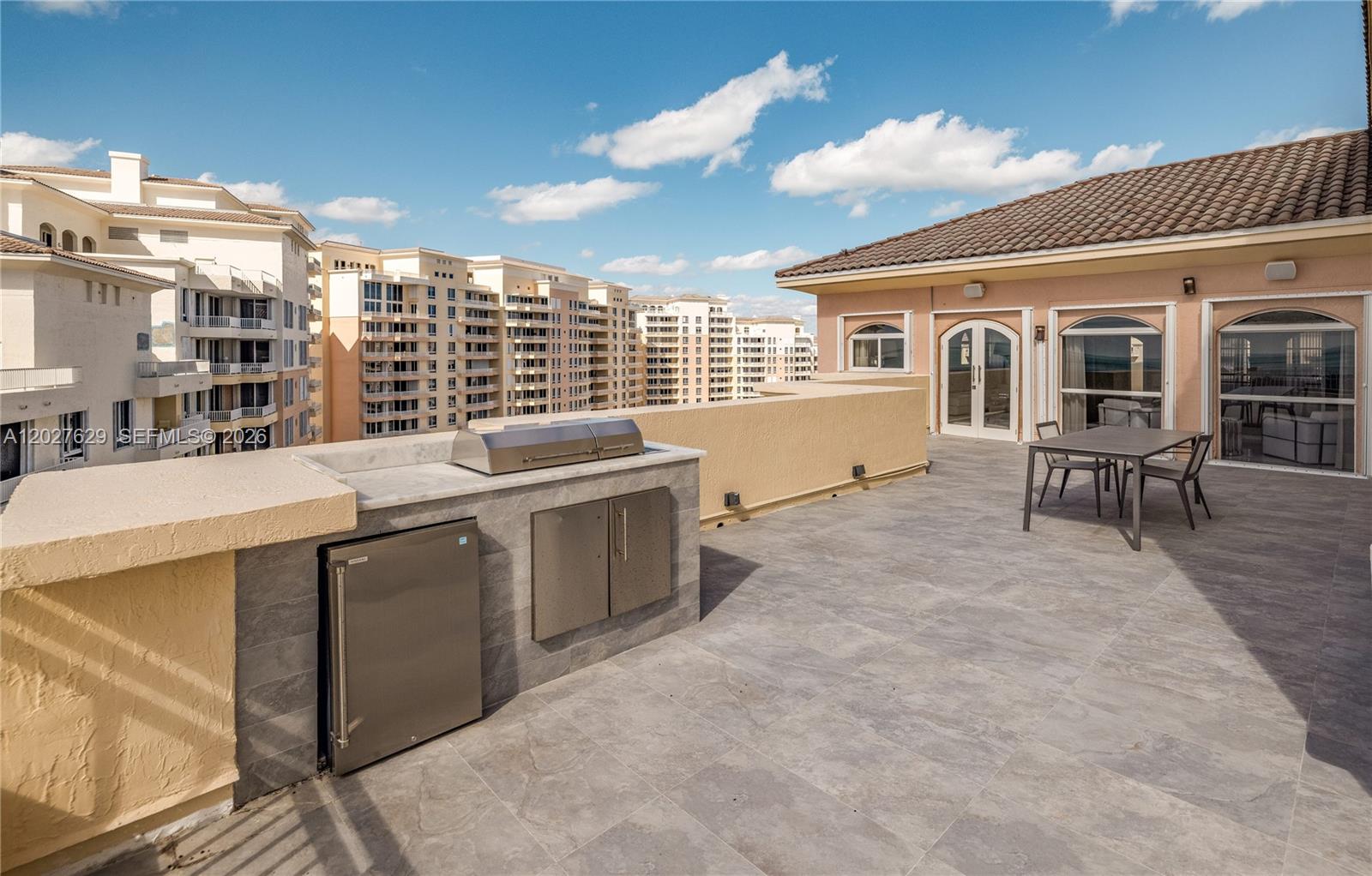 799 Crandon Boulevard, Unit PH8 Key Biscayne, FL 33149 - Photo 26 of 47 a view of terrace with seating space