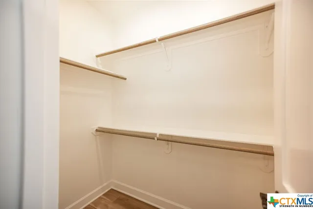 a view of small space with racks on the wall