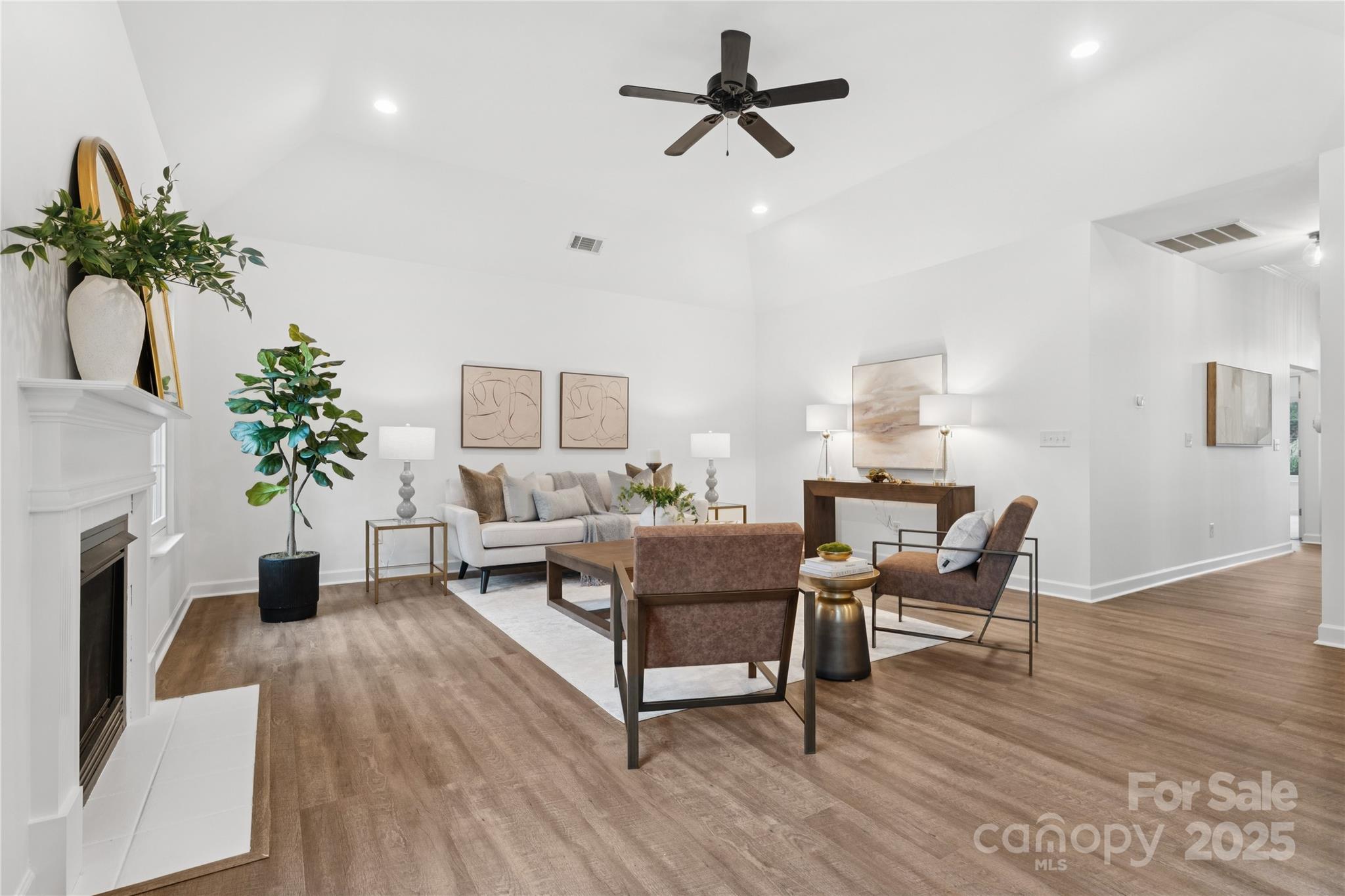 312 Albany Street Fort Mill, SC 29715 - Photo 12 of 36 a living room with furniture and a potted plant