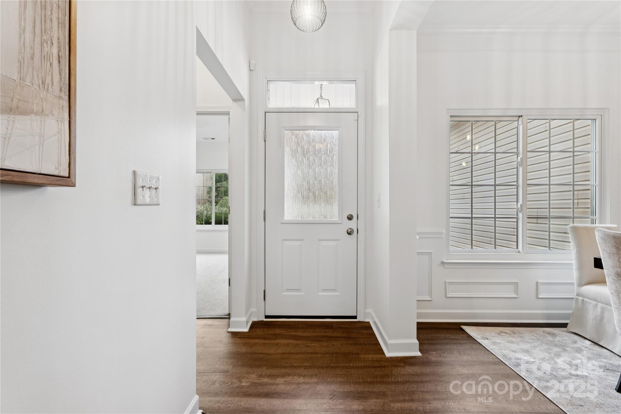 312 Albany Street Fort Mill, SC 29715 - Photo 25 of 36 an empty room with wooden floor and windows
