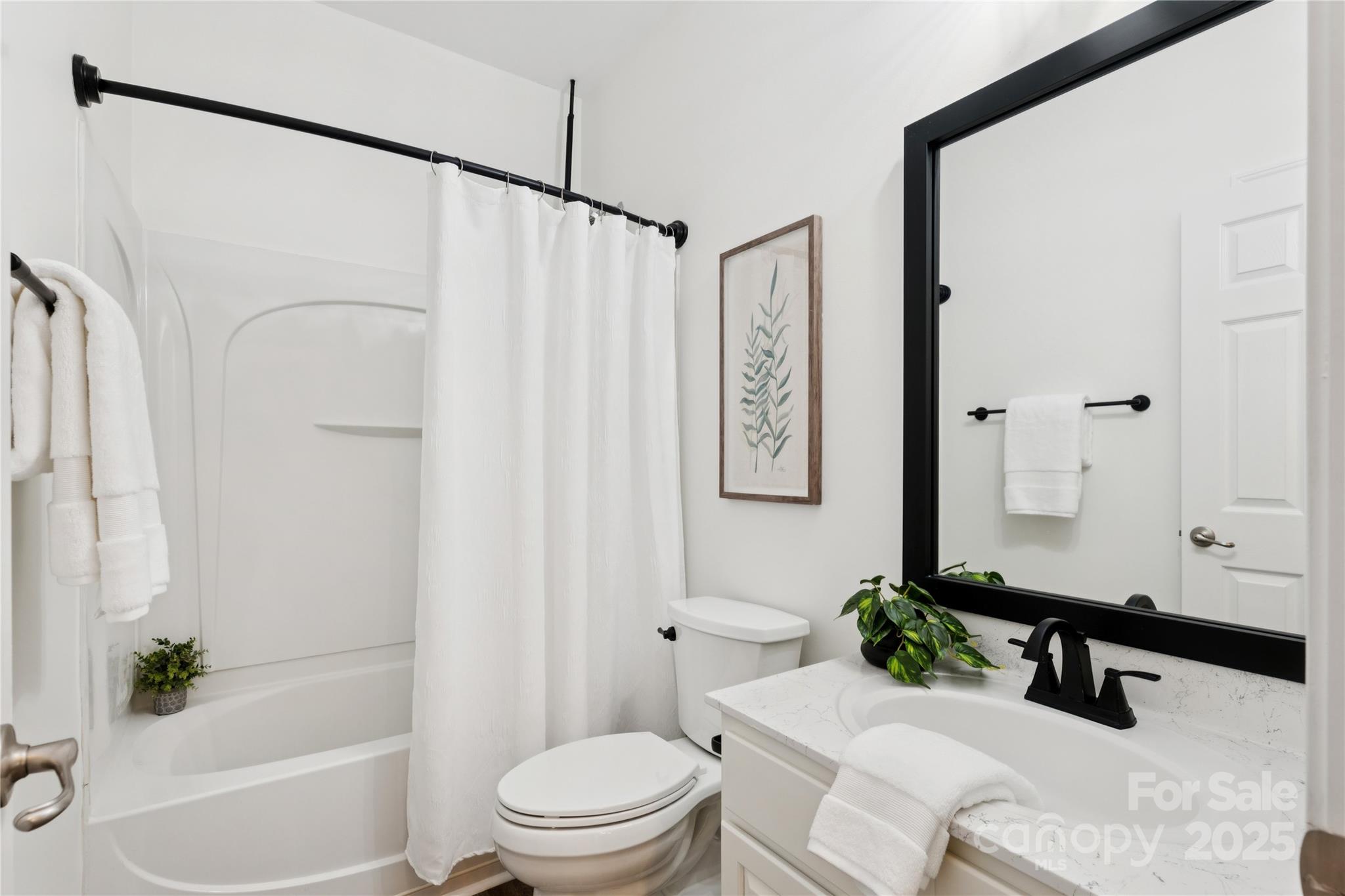 312 Albany Street Fort Mill, SC 29715 - Photo 29 of 36 a bathroom with a sink a toilet and a bathtub