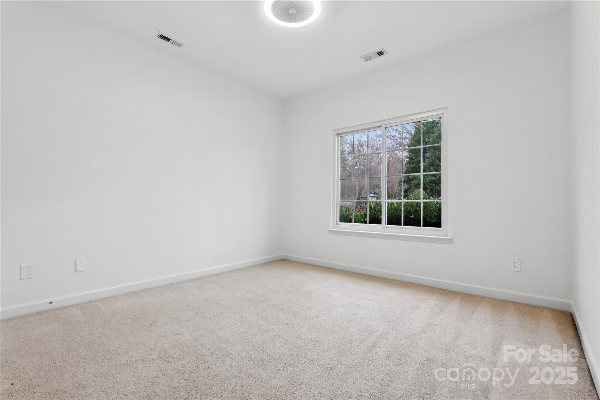 312 Albany Street Fort Mill, SC 29715 - Photo 30 of 36 an empty room with a window