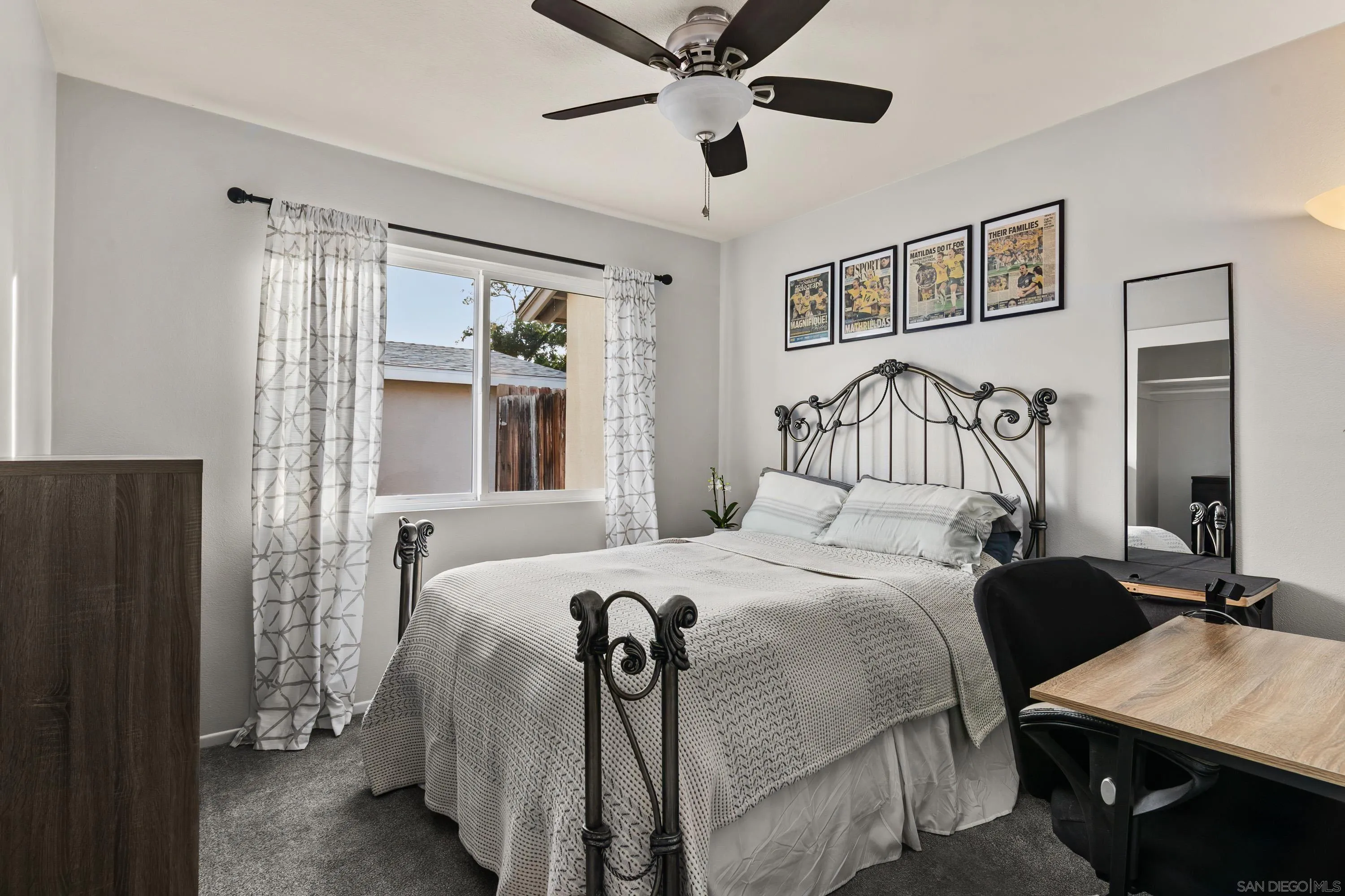 13314 Powers Road Poway, CA 92064 - Photo 22 of 44 a bedroom with bed and a window