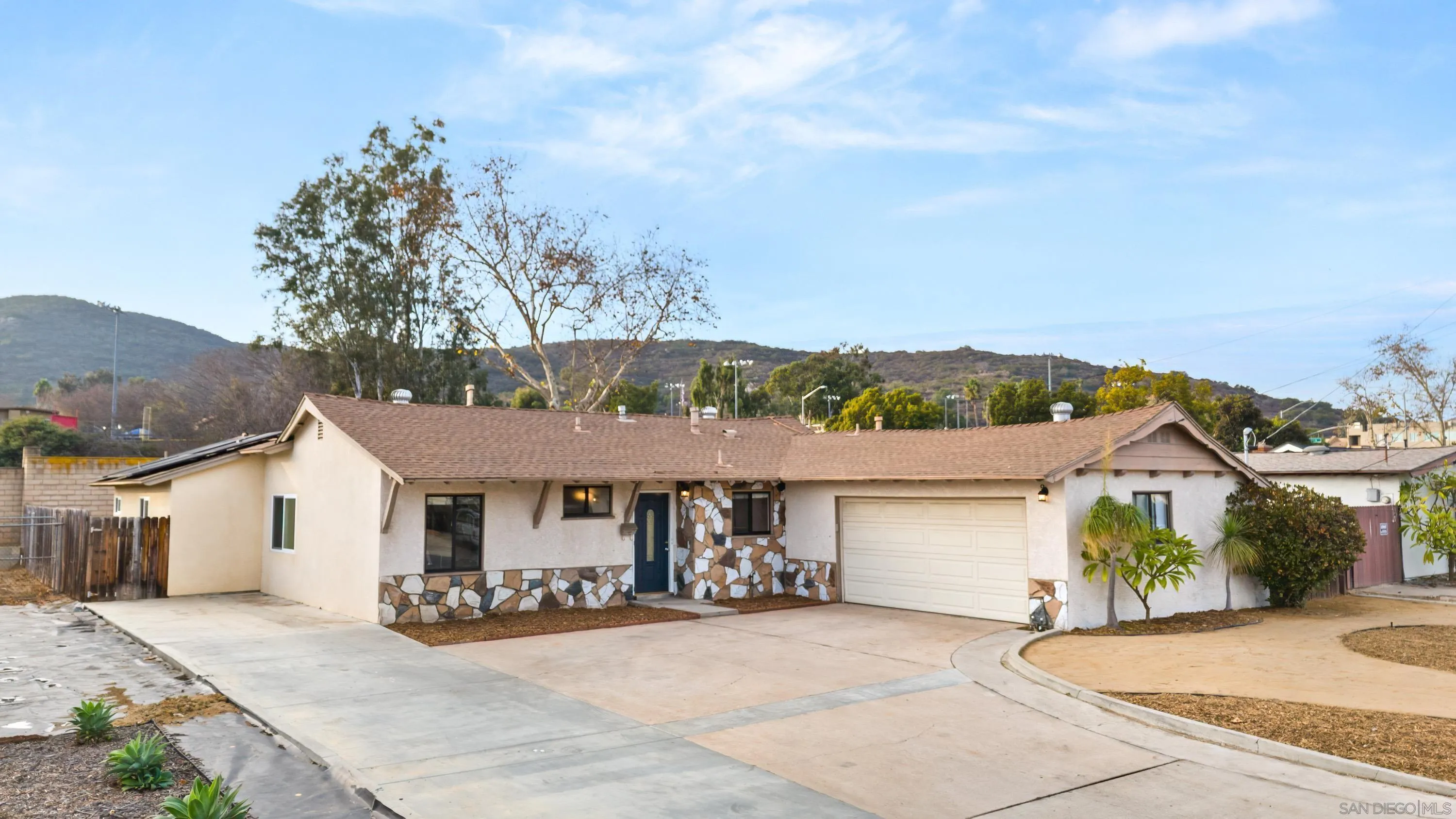13314 Powers Road Poway, CA 92064 - Photo 3 of 44 a view of a house with a patio