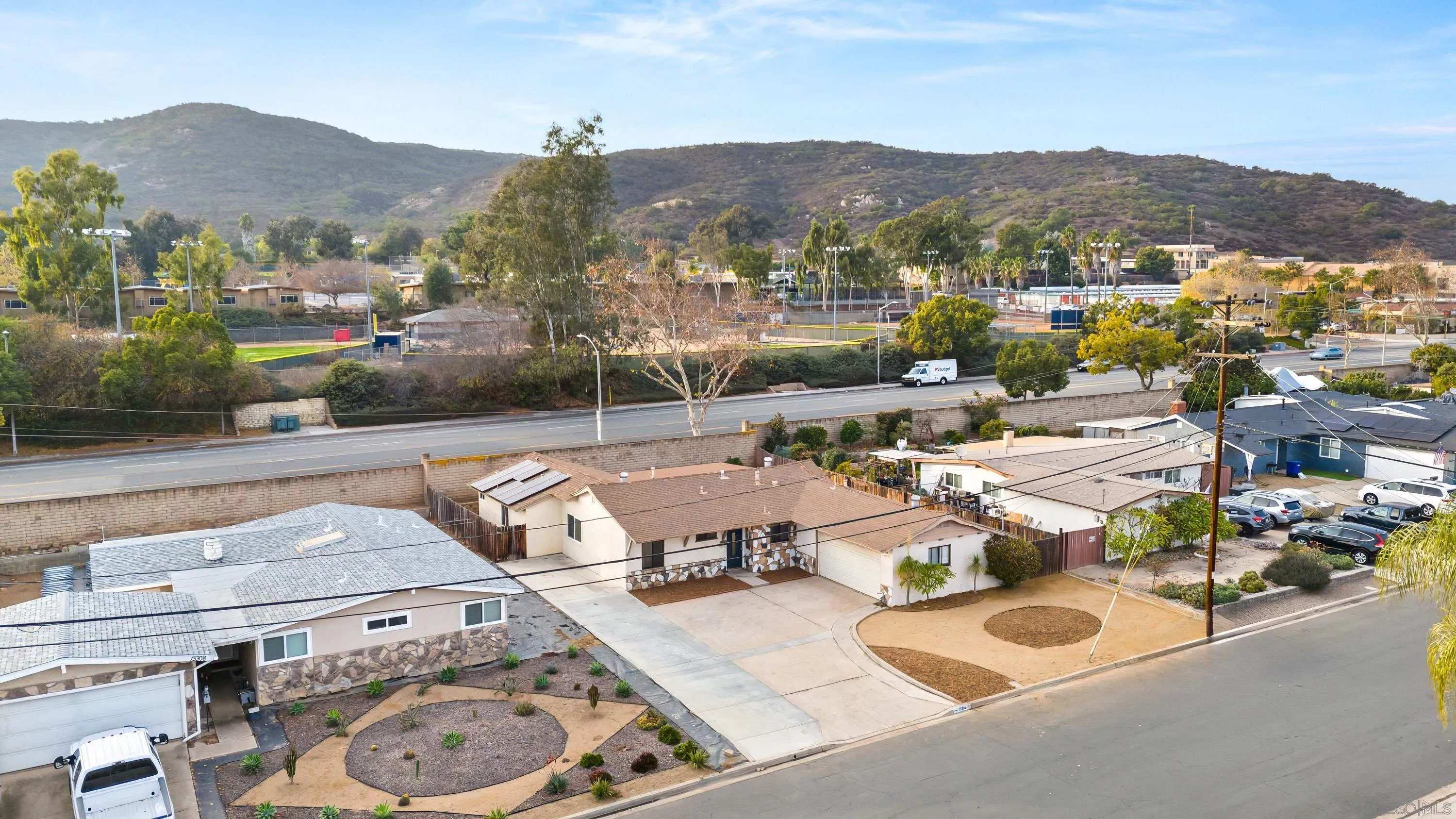 13314 Powers Road Poway, CA 92064 - Photo 40 of 44 a view of a terrace with furniture and a mountain view