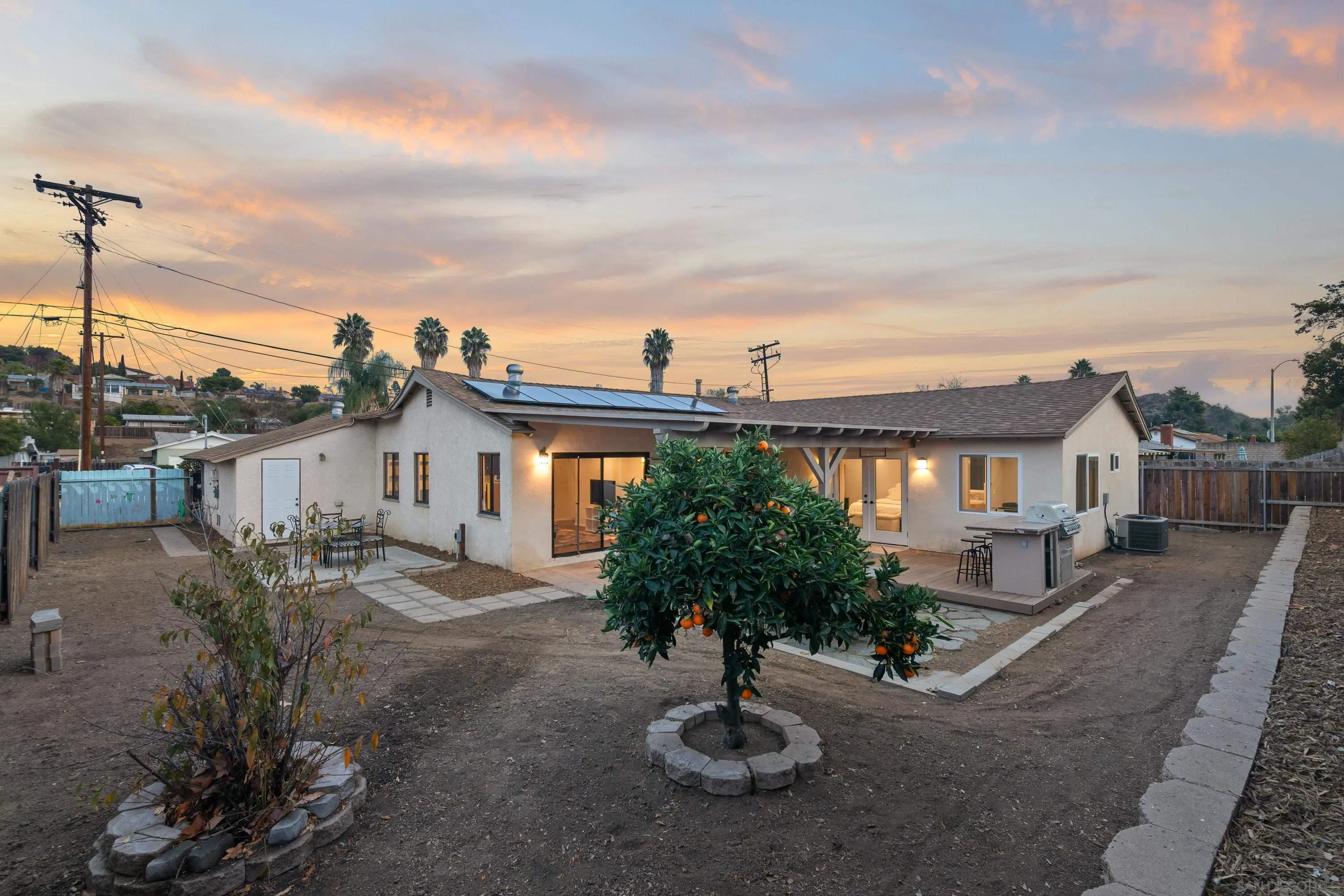 13314 Powers Road Poway, CA 92064 - Photo 4 of 44 a front view of a house with garden