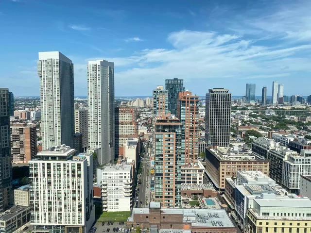 a city view with tall buildings