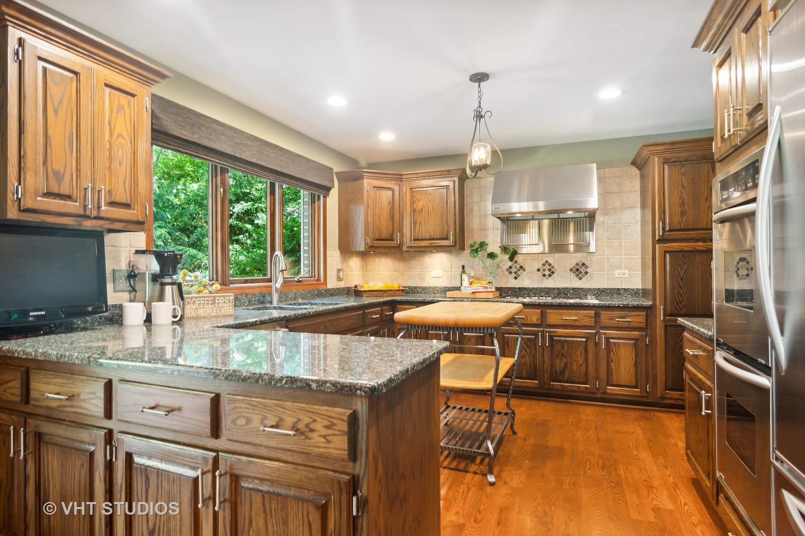 21370 North Andover Road Kildeer, IL 60047 - Photo 8 of 46 a kitchen with a sink stove and cabinets