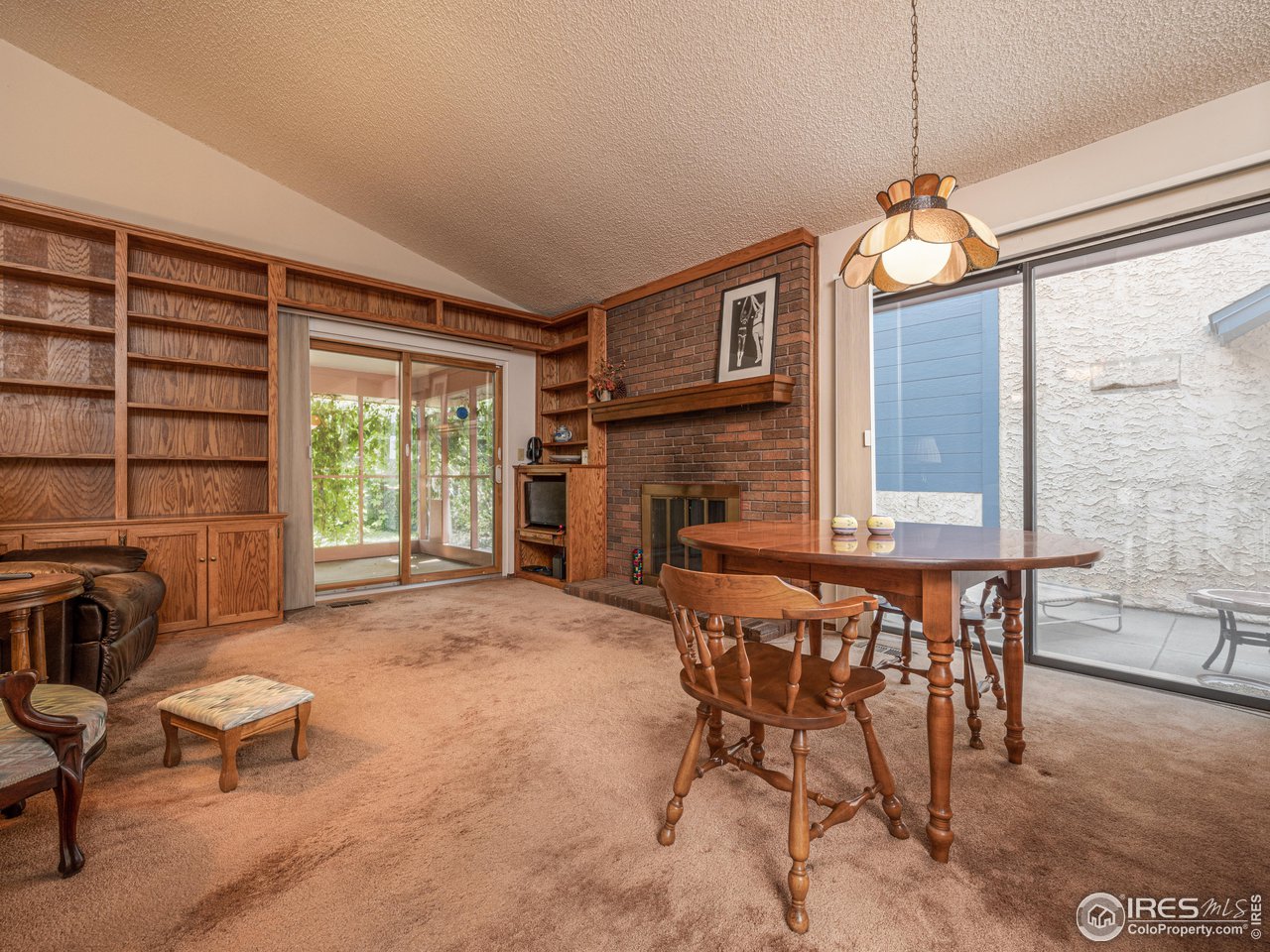 314 Eagle Court Longmont, CO 80504 - Photo 20 of 40 a dining room with furniture and window