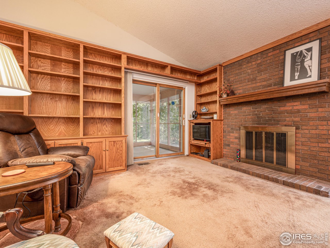 314 Eagle Court Longmont, CO 80504 - Photo 23 of 40 a view of a livingroom with furniture and staircase