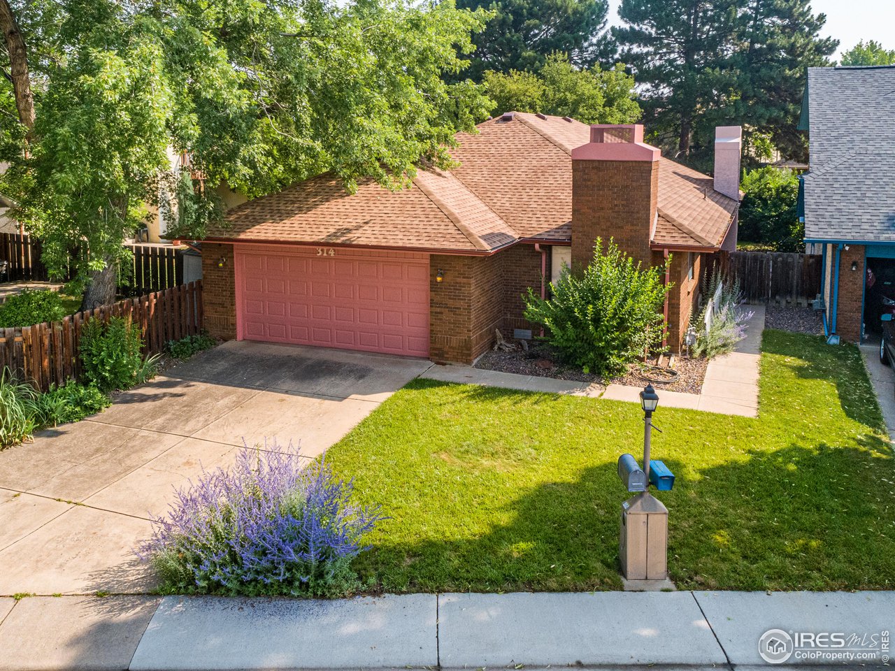 314 Eagle Court Longmont, CO 80504 - Photo 4 of 40 a view of backyard of house with green space