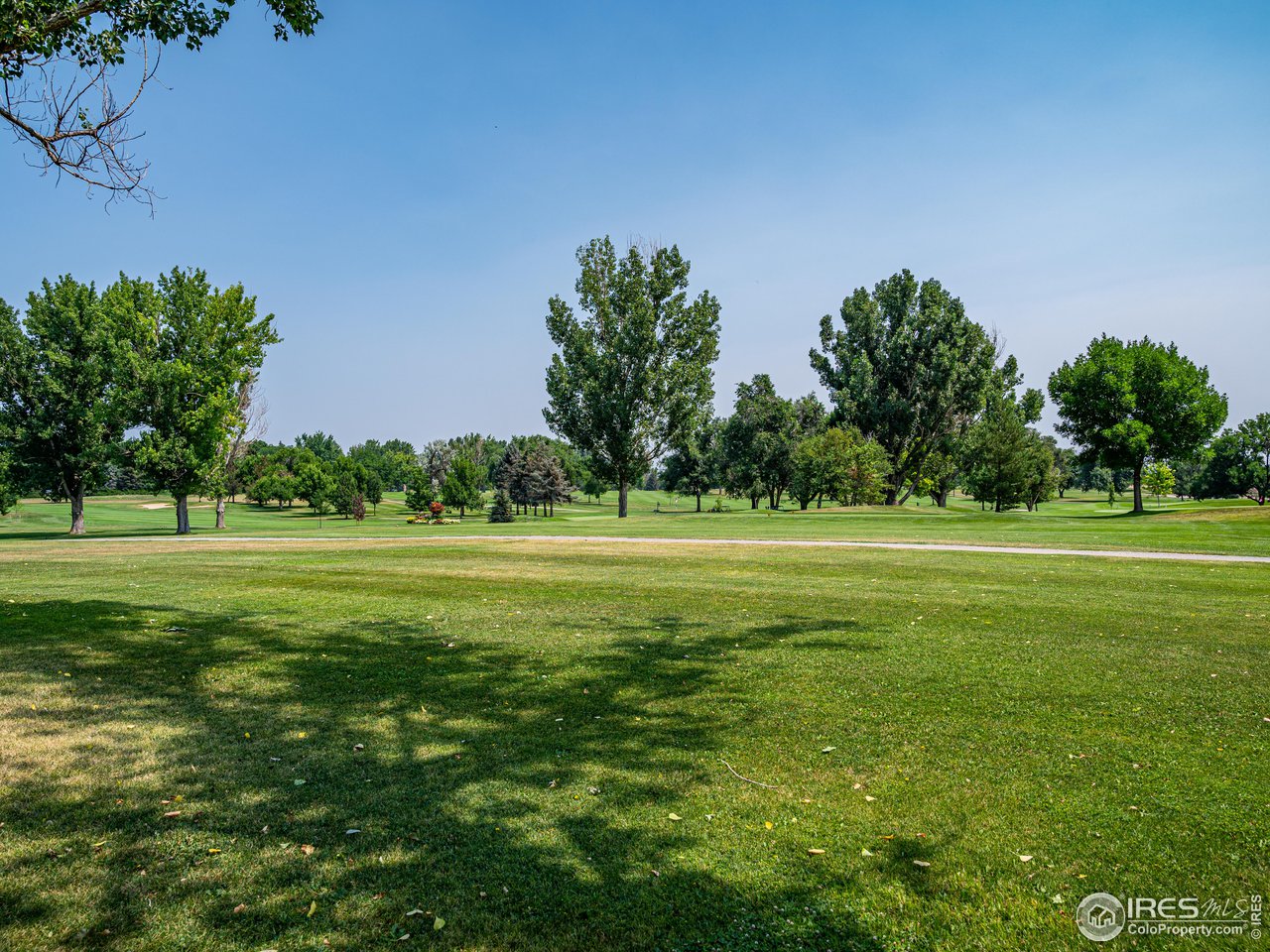 314 Eagle Court Longmont, CO 80504 - Photo 6 of 40 a view of a green field with clear sky