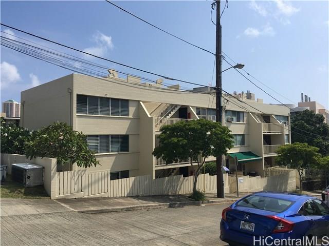 502 Captain Cook Avenue, Unit 103 Honolulu, HI 96813 - Photo 1 of 1 a front view of a house with a garden